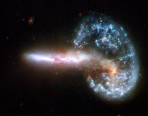 Una galaxia con forma de pene desgarra un agujero negro