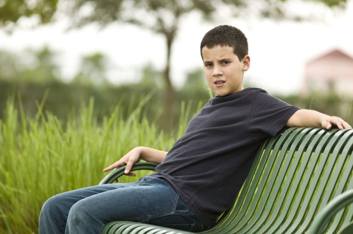 Child sitting at the park